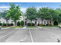 Three-unit townhome building with parking and landscaping at 120 Cadbury Ln, Fort Mill, SC 29715