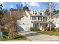 Two-story house with attached garage and landscaping at 3131 Pine Bluff Way, Fort Mill, SC 29707