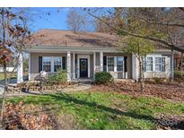 Charming craftsman style home with a covered porch at 12128 Robins Nest Ln, Charlotte, NC 28269