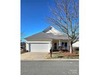 Ranch style home with attached garage and manicured lawn at 1001 Jessica Ln, Matthews, NC 28104