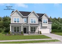Two story house with gray siding, white trim, and a three car garage at 316 Coronado Ave, Matthews, NC 28104