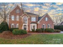 Inviting two-story home with lush landscaping at 13101 Whisper Creek Dr, Charlotte, NC 28277