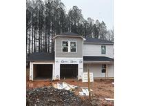 Two-story home under construction with a two-car garage at 446 Deaton St, Statesville, NC 28677