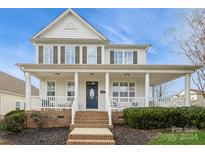 Two-story house with front porch and landscaping at 3589 County Down Ave, Kannapolis, NC 28081