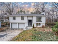 Charming ranch home with a two-car garage and well-manicured lawn at 6726 Wannamaker Ln, Charlotte, NC 28226