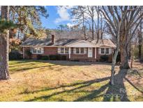 Brick ranch house with a spacious yard at 800 Peachtree Rd, Charlotte, NC 28216