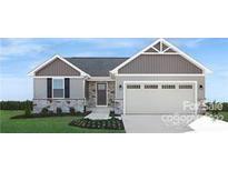 New construction home features attractive exterior and landscaping at 595 Nesbe St # 2226, Lancaster, SC 29720