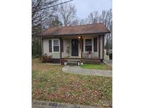 Charming one-story home with a cozy front porch at 210 N Meriah St, Landis, NC 28088