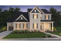 Two-story house with gray siding, gray shutters, and a landscaped front yard at 14117 White Gardens Ln # 8, Huntersville, NC 28078