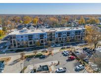 Aerial view of building and parking lot with surrounding neighborhood visible at 2401 Euclid Ave # 302, Charlotte, NC 28203