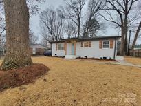 Newly renovated ranch home with fresh landscaping at 106 Greentree Dr, Mount Holly, NC 28120