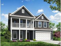 Two-story house with gray siding, white trim, and a two-car garage at 5124 Heathland Dr # 78, Charlotte, NC 28215