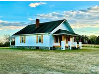 Charming one-story home features a covered porch and updated siding at 2241 W Chester School Rd, Chester, SC 29706