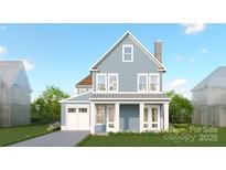 Two-story home with gray siding, white trim, and a covered porch at 4391 Morning Mist Dr # 14, Sherrills Ford, NC 28673