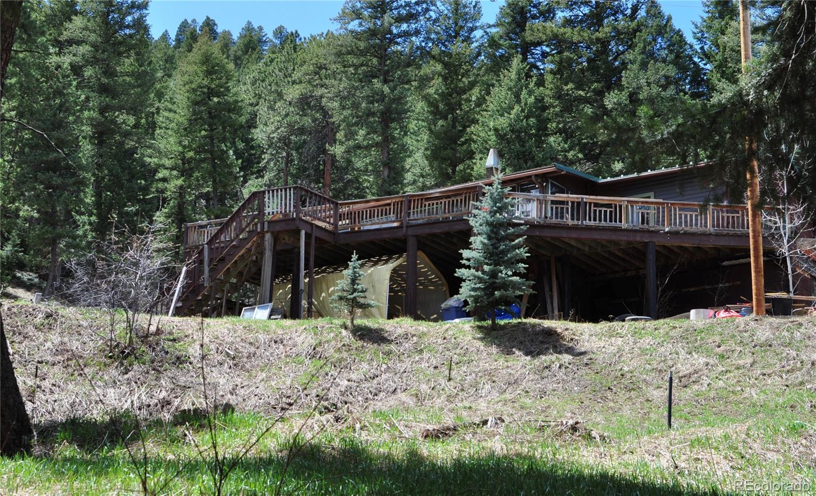 Photo one of 21628 Taos Rd Indian Hills CO 80454 | MLS 2480500
