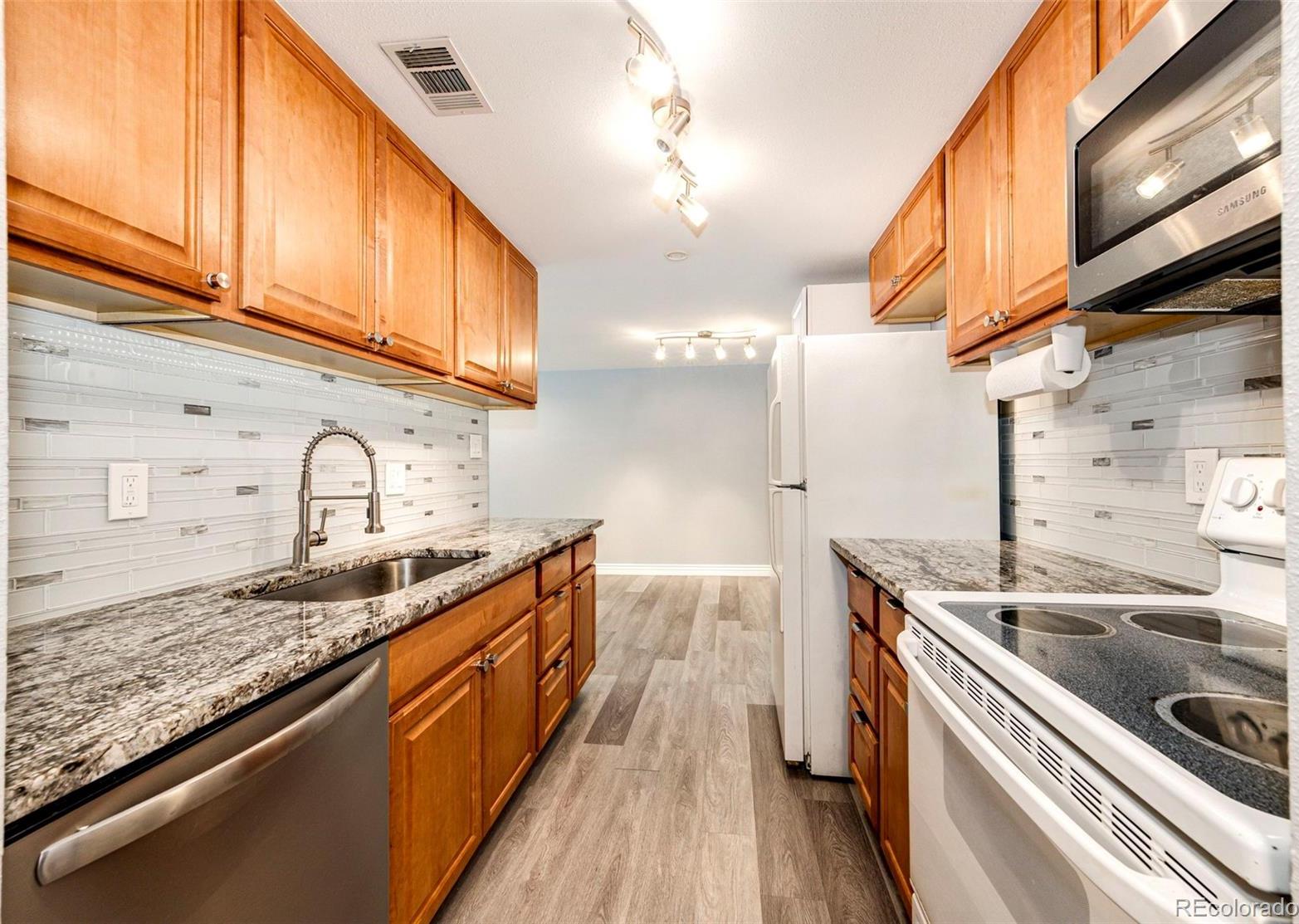 Photo one of 7395 E Quincy Ave # 102 Denver CO 80237 | MLS 4448824
