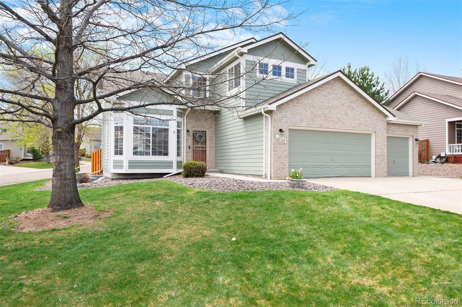 Photo one of 16148 W 70Th Pl Arvada CO 80007 | MLS 6008359