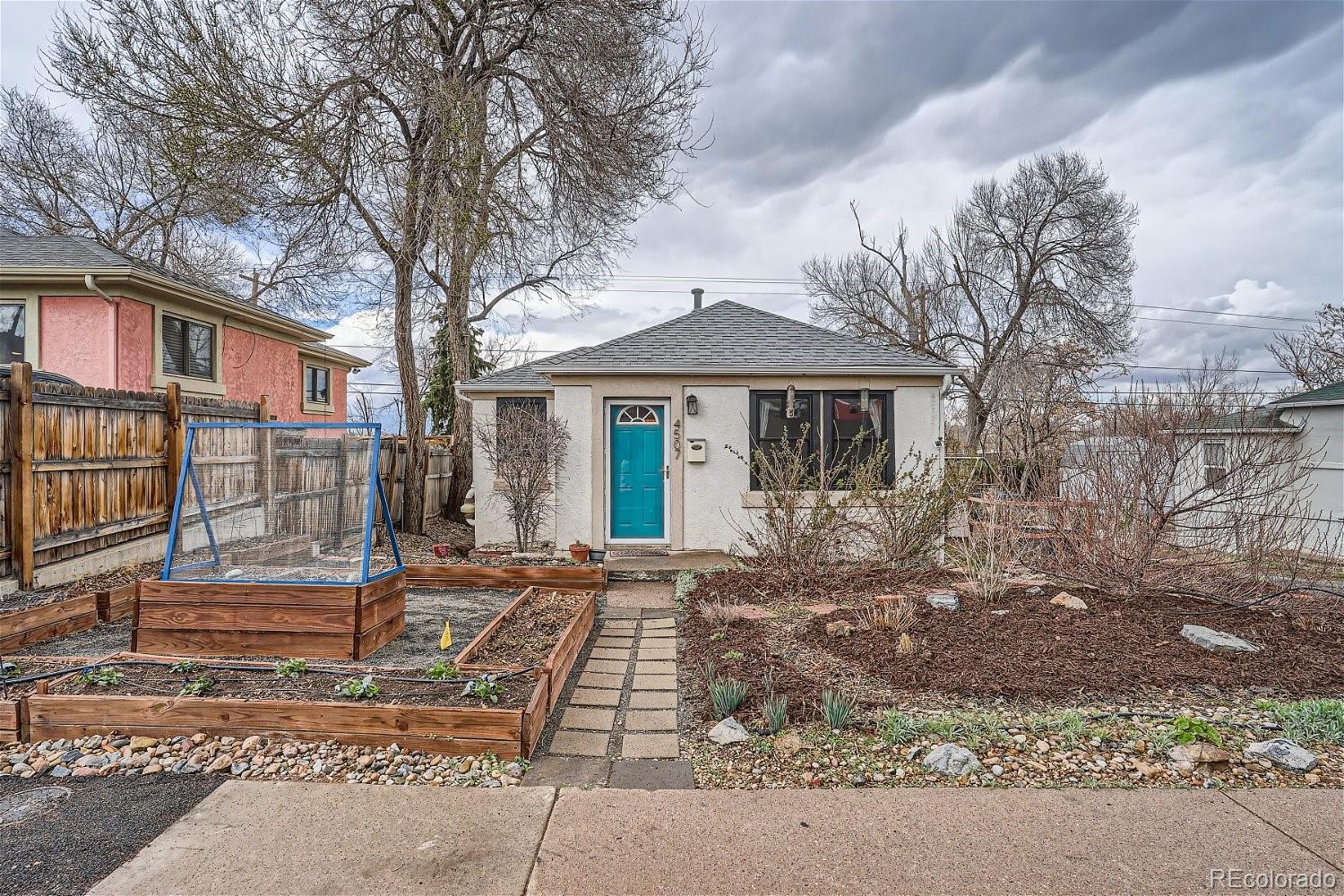 Photo one of 4507 W Exposition Ave Denver CO 80219 | MLS 8448464