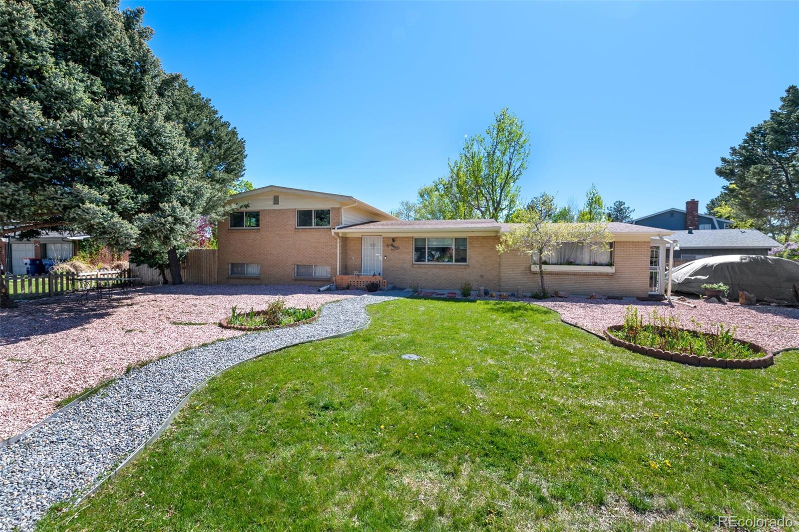 Photo one of 580 S Parfet St Lakewood CO 80226 | MLS 9244958