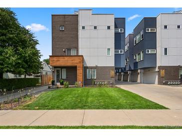 Modern townhouses with attached garages and front yard at 3425 W 16Th Ave, Denver, CO 80204