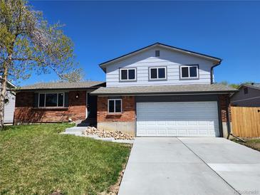Photo one of 9407 W Brittany Ave Littleton CO 80123 | MLS 1670473