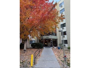 Building exterior showcasing autumn foliage at 13601 E Marina Dr # 510, Aurora, CO 80014