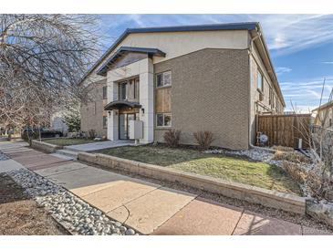 Contemporary style building exterior, featuring a clean design and landscaping at 2460 W Caithness Pl # 104, Denver, CO 80211