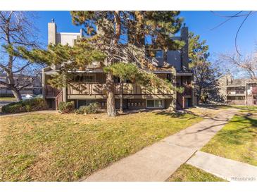 Attractive exterior of a townhouse with a well-maintained lawn at 5300 E Cherry Creek South Dr # 905, Denver, CO 80246