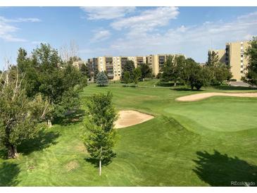 Spacious condo community with green spaces and golf course views at 3144 S Wheeling Way # 410, Aurora, CO 80014