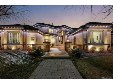 Stunning two-story home with stone accents and landscaping at 5831 S Albion Ct, Greenwood Village, CO 80121