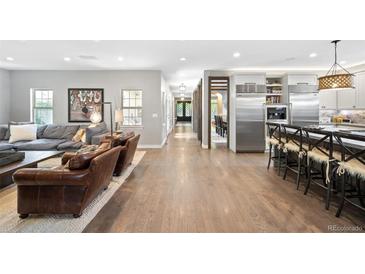 Spacious kitchen featuring stainless steel appliances and a large island at 1214 S Fillmore St, Denver, CO 80210