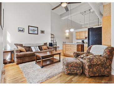 Spacious living room with hardwood floors at 1555 California St # 316, Denver, CO 80202