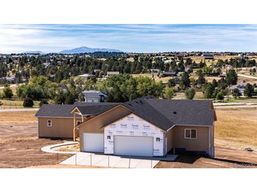New construction home with mountain views and large lot at 37057 Still Rock Pt, Elizabeth, CO 80107