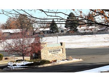 Stone entrance sign for The Boulders at Aspen Ridge community at 3220 Boulder Cir # 103, Broomfield, CO 80023