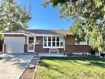 Charming ranch-style home with landscaped yard at 3480 W 96Th Ave, Westminster, CO 80031