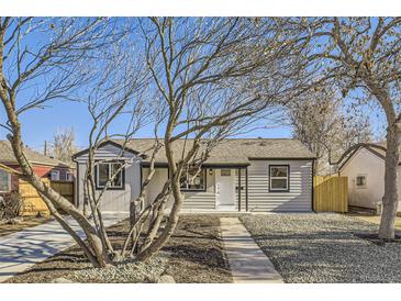 Cute bungalow with a newly landscaped front yard at 1960 Iola St, Aurora, CO 80010