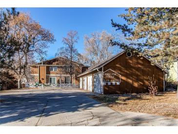 Attractive exterior of a two-story home with attached garage and landscaping at 229 Bross St # D, Longmont, CO 80501