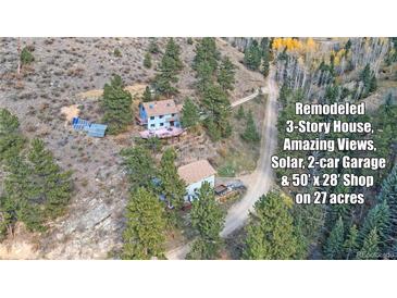Remodeled 3-story house, amazing views, solar, 2-car garage, shop on 27 acres at 420 Chinook Rd, Idaho Springs, CO 80452