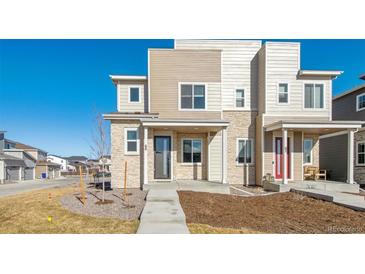 Modern two-story home with attached two-car garage at 60 S Trussville St, Aurora, CO 80018
