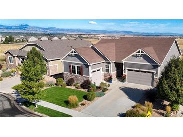 Aerial view of a ranch style home with a gray exterior and landscaping at 4111 W 149Th Ave, Broomfield, CO 80023