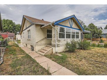 Charming bungalow with a newly landscaped front yard at 3637 Lowell Blvd, Denver, CO 80211