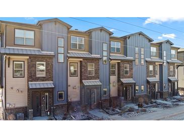 Exterior view of a row of townhouses at 1025 S Gilbert St # C, Castle Rock, CO 80104