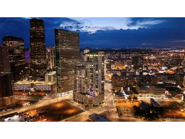 Night aerial view of high rise building in city at 2001 Lincoln St # 3223, Denver, CO 80202