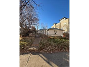 Duplex home with yard and gated entry at 3577 S Pennsylvania St, Englewood, CO 80113