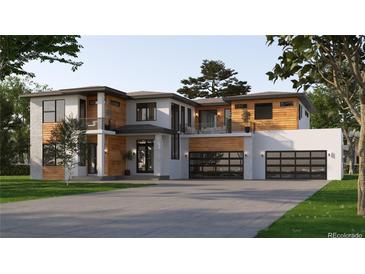 Two-story modern home with wood and white exterior, three-car garage, and landscaped lawn at 5266 Flora Way, Arvada, CO 80004