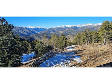 Spectacular mountain views from this scenic property, offering breathtaking panoramas at 1528 Chinook Rd, Idaho Springs, CO 80452