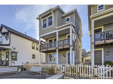 Two-story townhome with a charming front yard at 128 E Douglas St, Superior, CO 80027