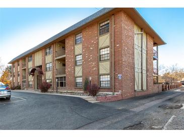 Brick apartment building with ample parking at 1021 Carr St # 22, Lakewood, CO 80214