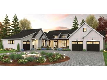 Two story house with white siding, black roof, and a two car garage at 314 Castlemaine Ct, Castle Rock, CO 80104
