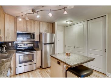Photo one of 1121 Albion St # 205 Denver CO 80220 | MLS 6943030
